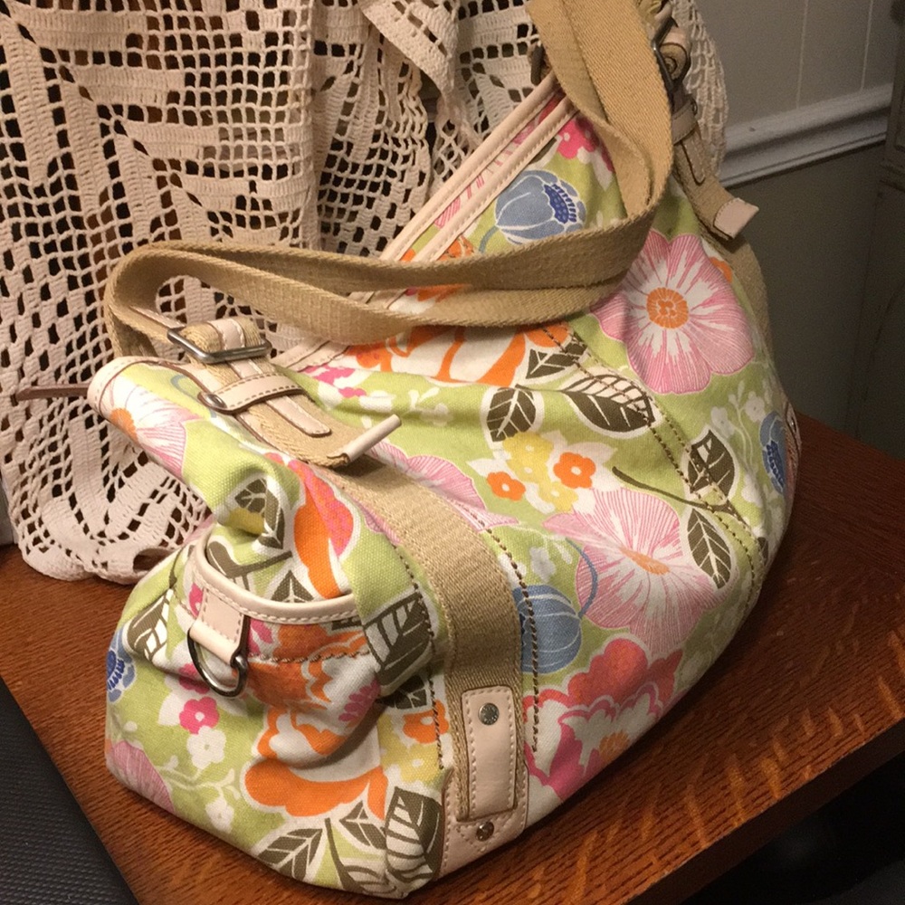 Canvas fossil zipper tote.